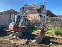 Photo de la Takeuchi TB180FR with 3 buckets and ripper tooth