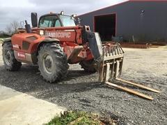 Imagen del Manitou MT 1030 S with bucket and forkboard